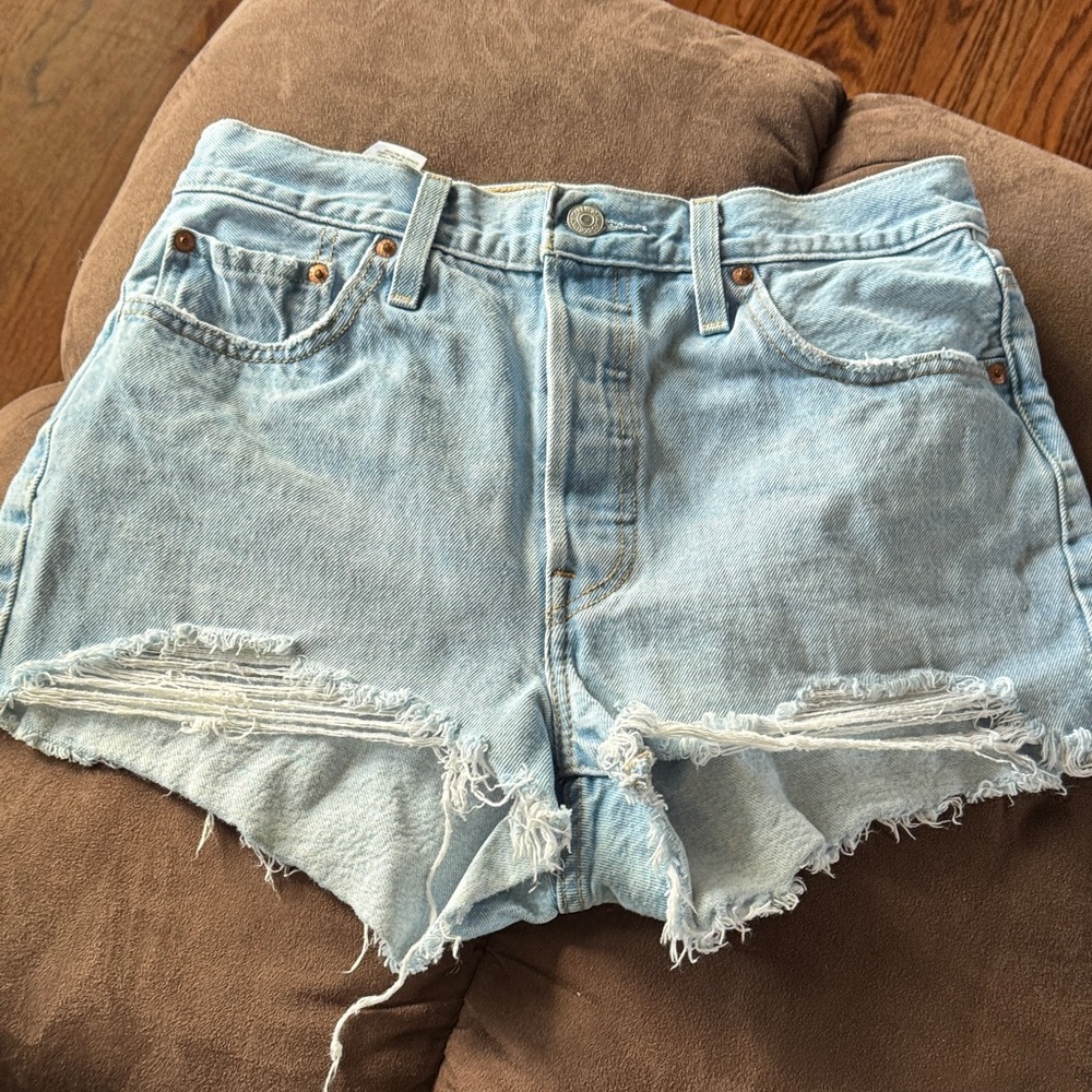 501 Light Blue Distressed Denim Shorts